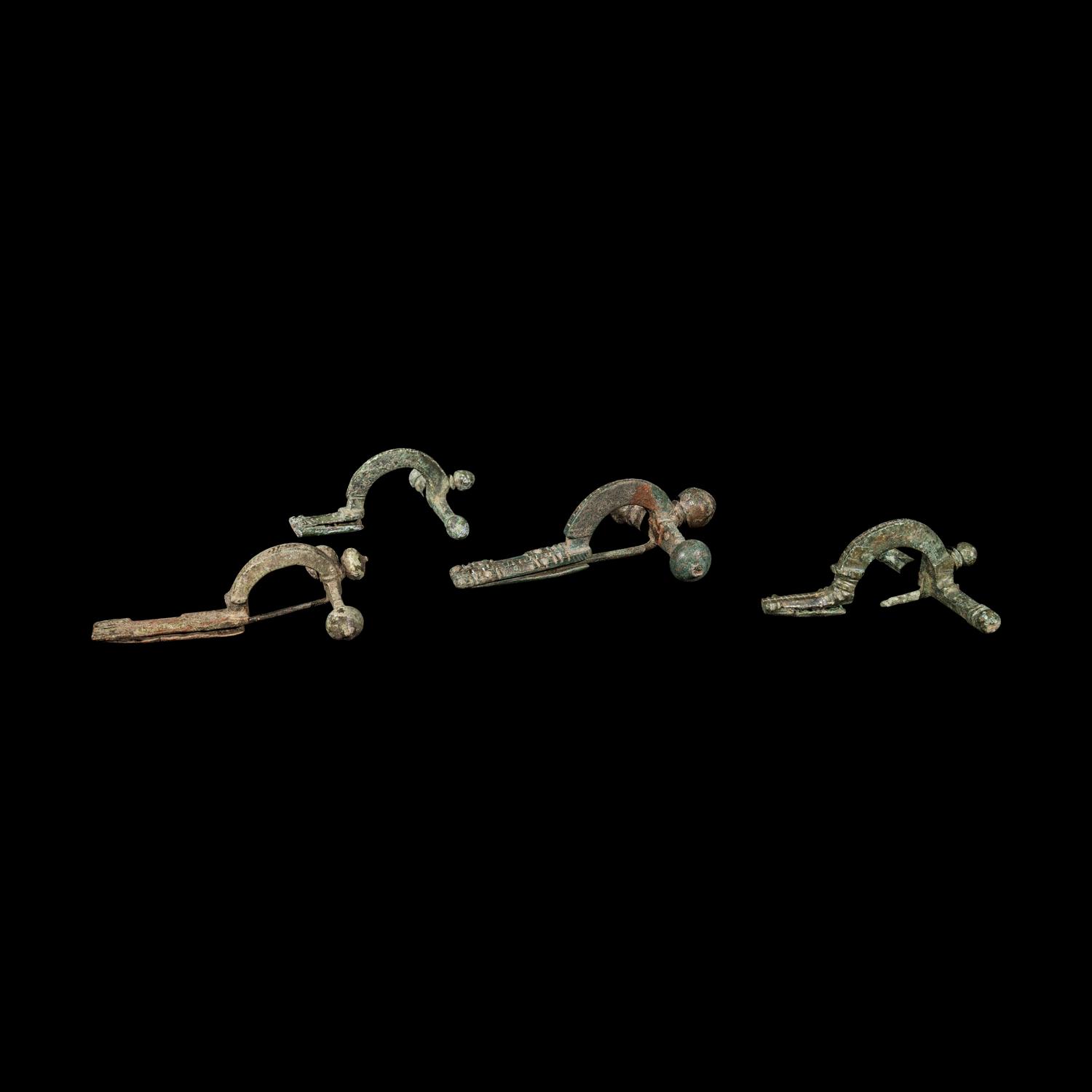 A Group of 5 Greco-Roman Fibulae and 2 Geometric Bronze Objects