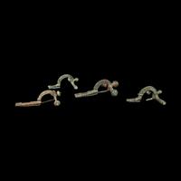 A Group of 5 Greco-Roman Fibulae and 2 Geometric Bronze Objects