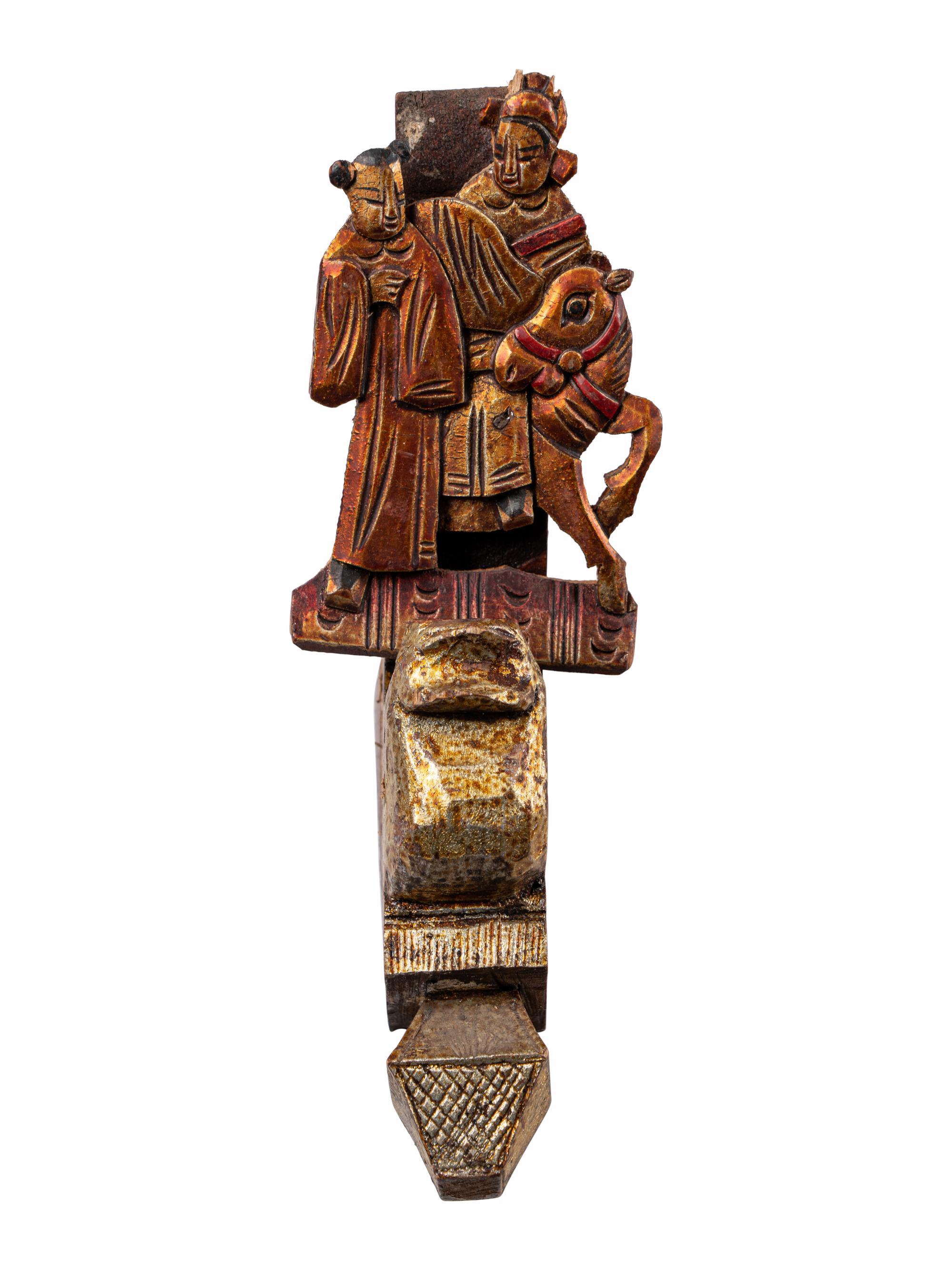 A Group of Chinese Gilt and Red Lacquered Wood Fragments