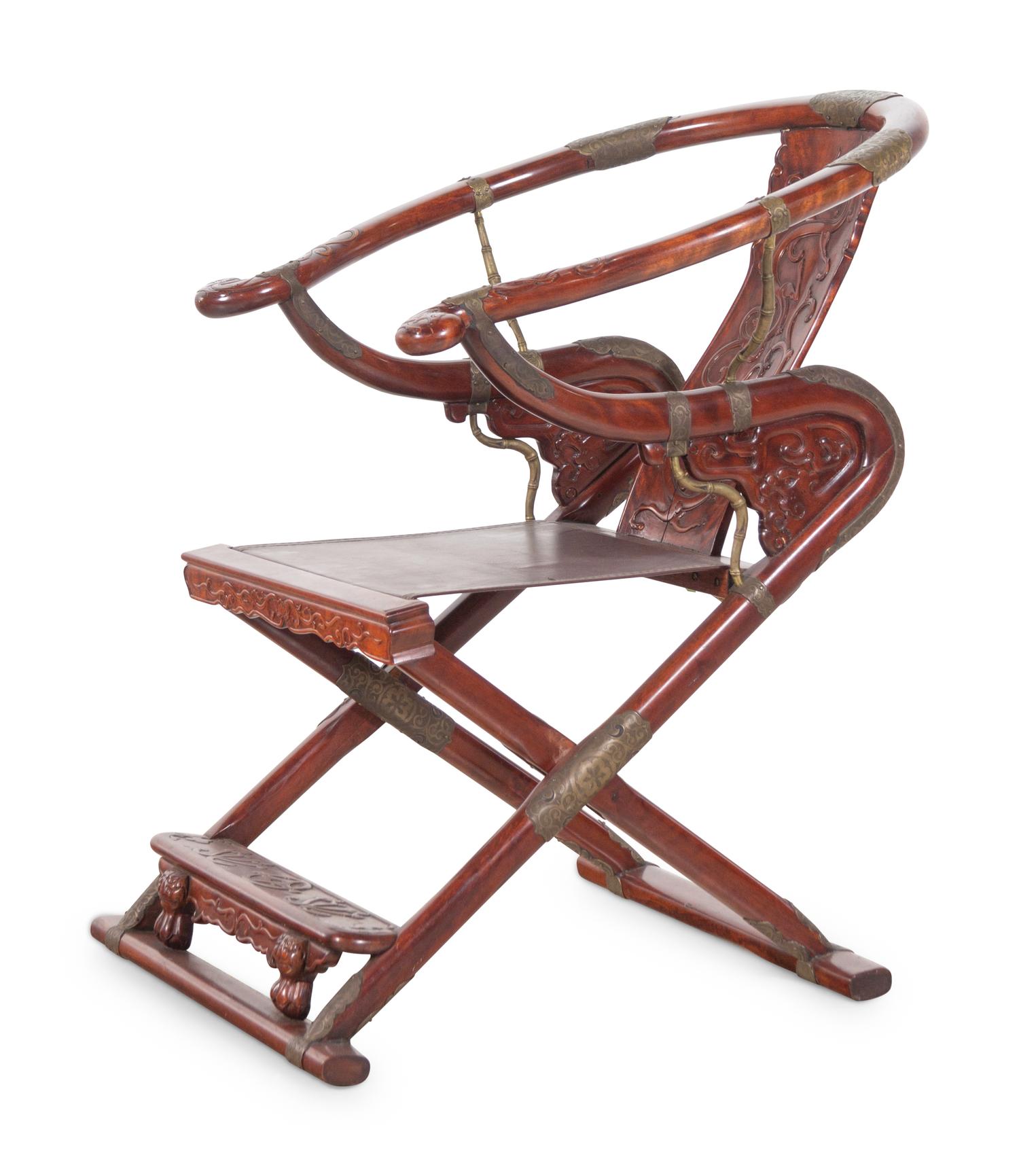 A Chinese Possibly Huanghuali Wood Folding Armchair, Jiaoyi