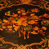 A Pair of Louis XV Style Gilt Bronze Mounted Marquetry Side Tables