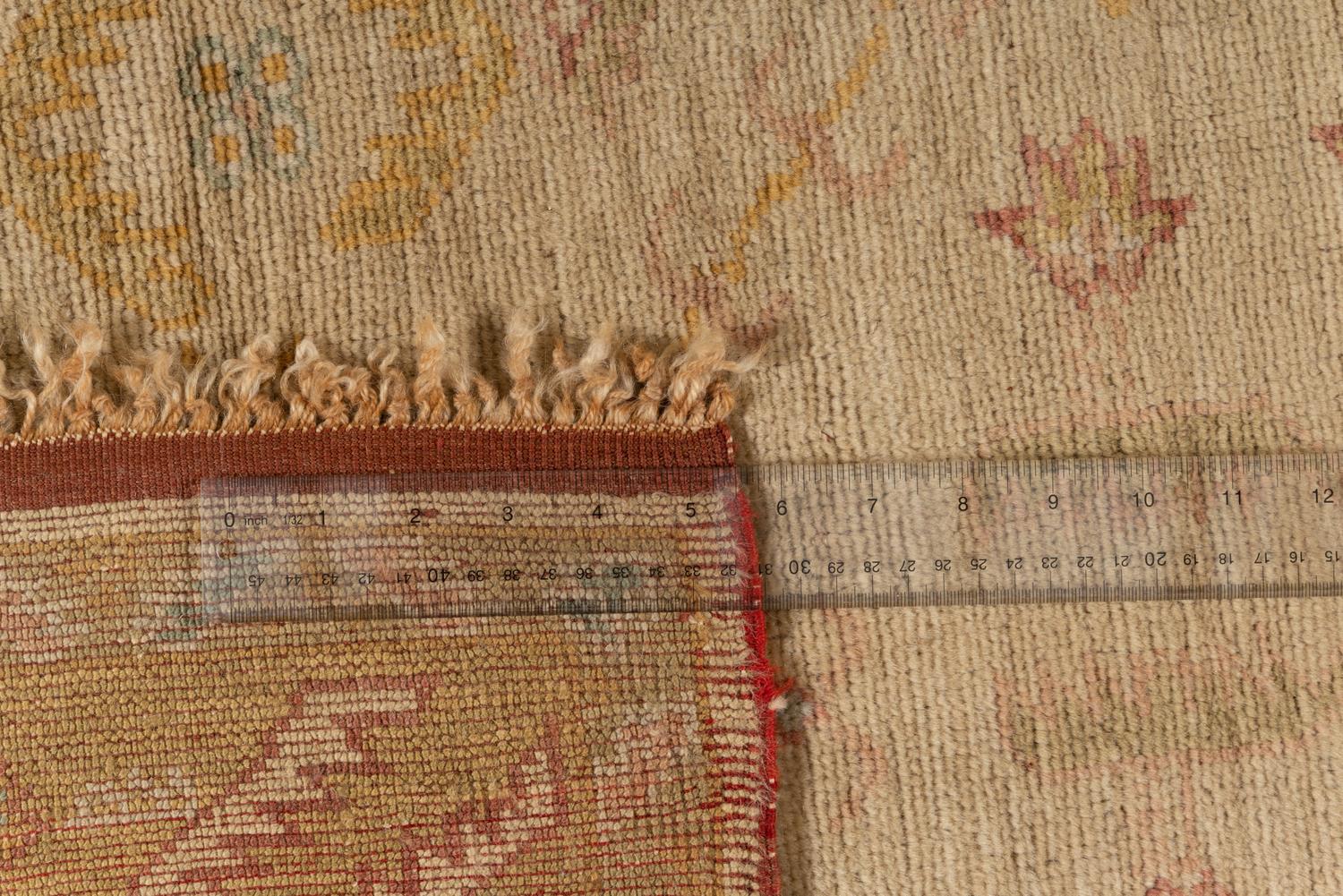 An Oushak Wool Rug