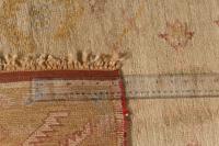 An Oushak Wool Rug
