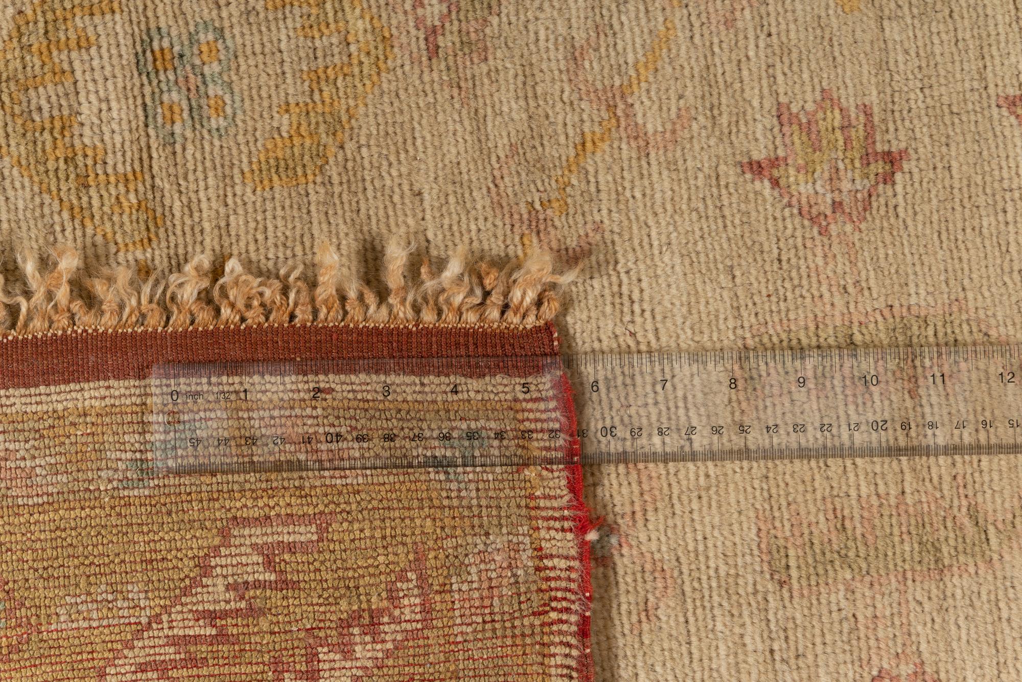 An Oushak Wool Rug