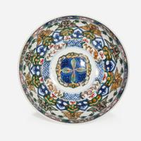 A Chinese wucai-decorated bowl, "mantou xin", and a Chinese blue and white porcelain Gu-form vase The bowl Kangxi period, the vase later