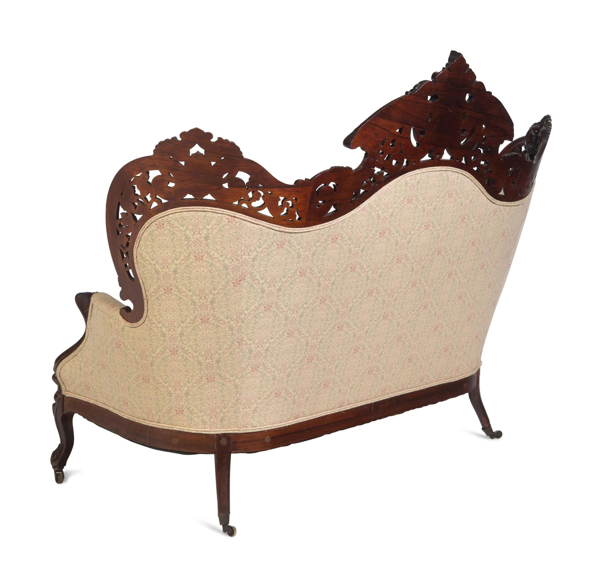 A Joseph Meeks and Sons Carved Rosewood Sofa