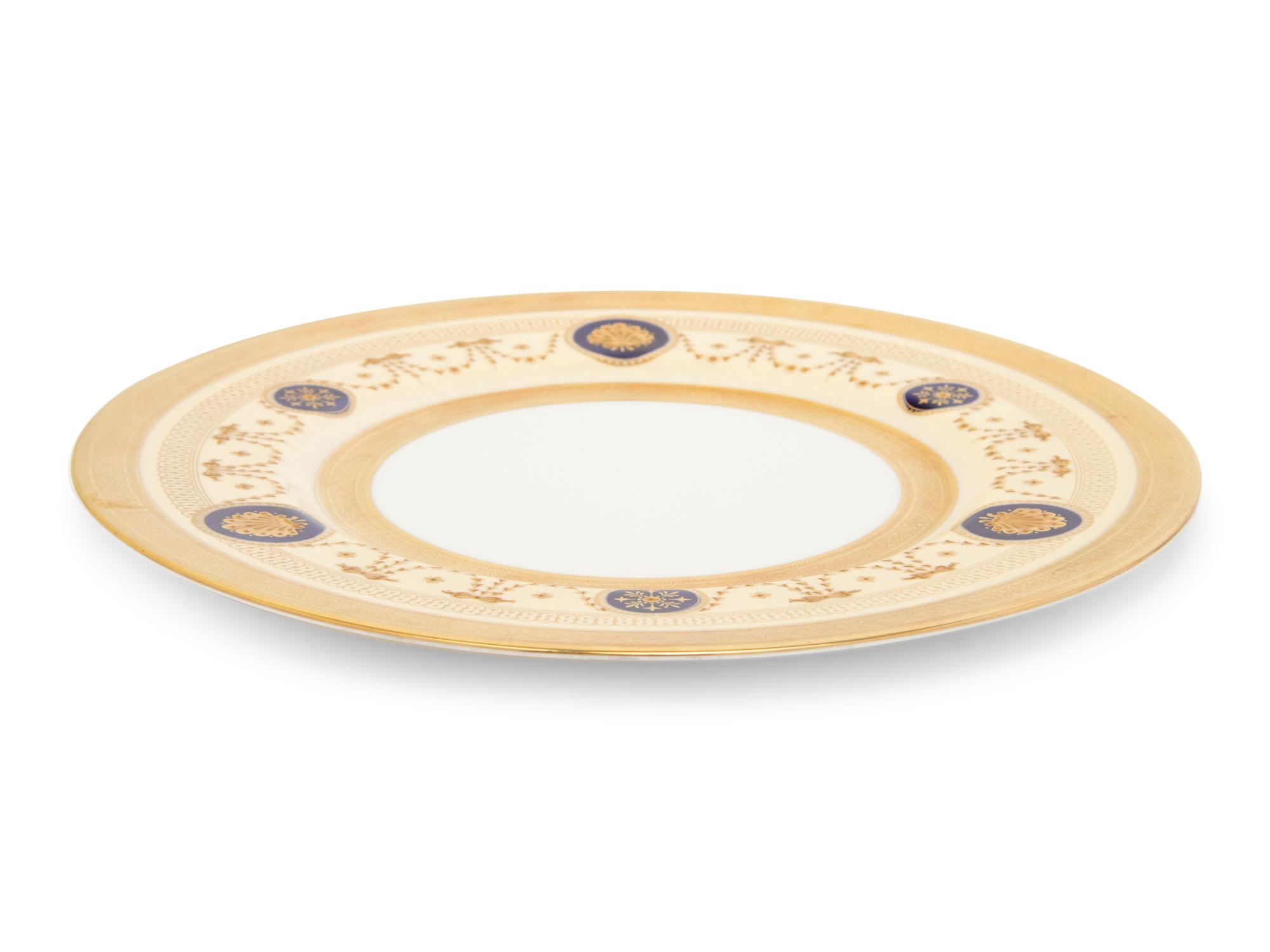 A Set of Fifteen Coalport Porcelain Dinner Plates
