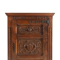 A Baroque Style Carved Oak Cabinet