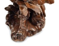 A Pair of Continental Carved Wood Figural Prickets