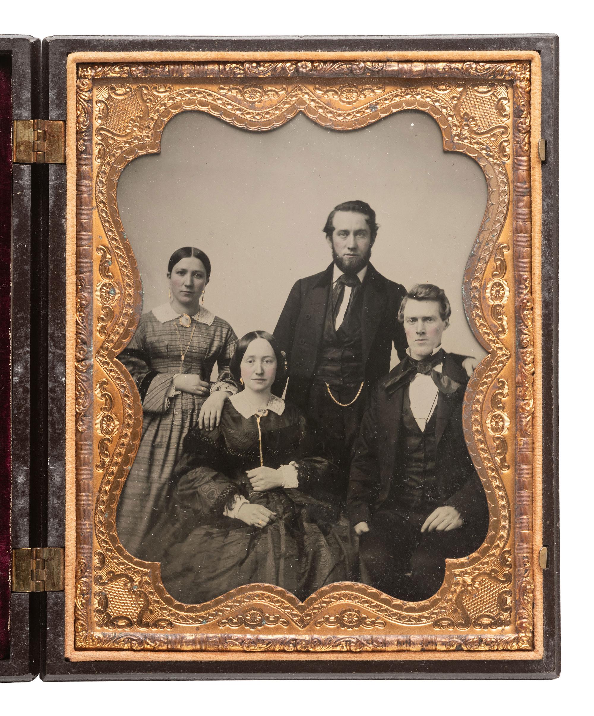 [EARLY PHOTOGRAPHY]. 5 lovely family and group portraits including 3 daguerreotype examples.