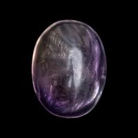 A Roman Amethyst Intaglio with a Portrait Head of a Veiled Man