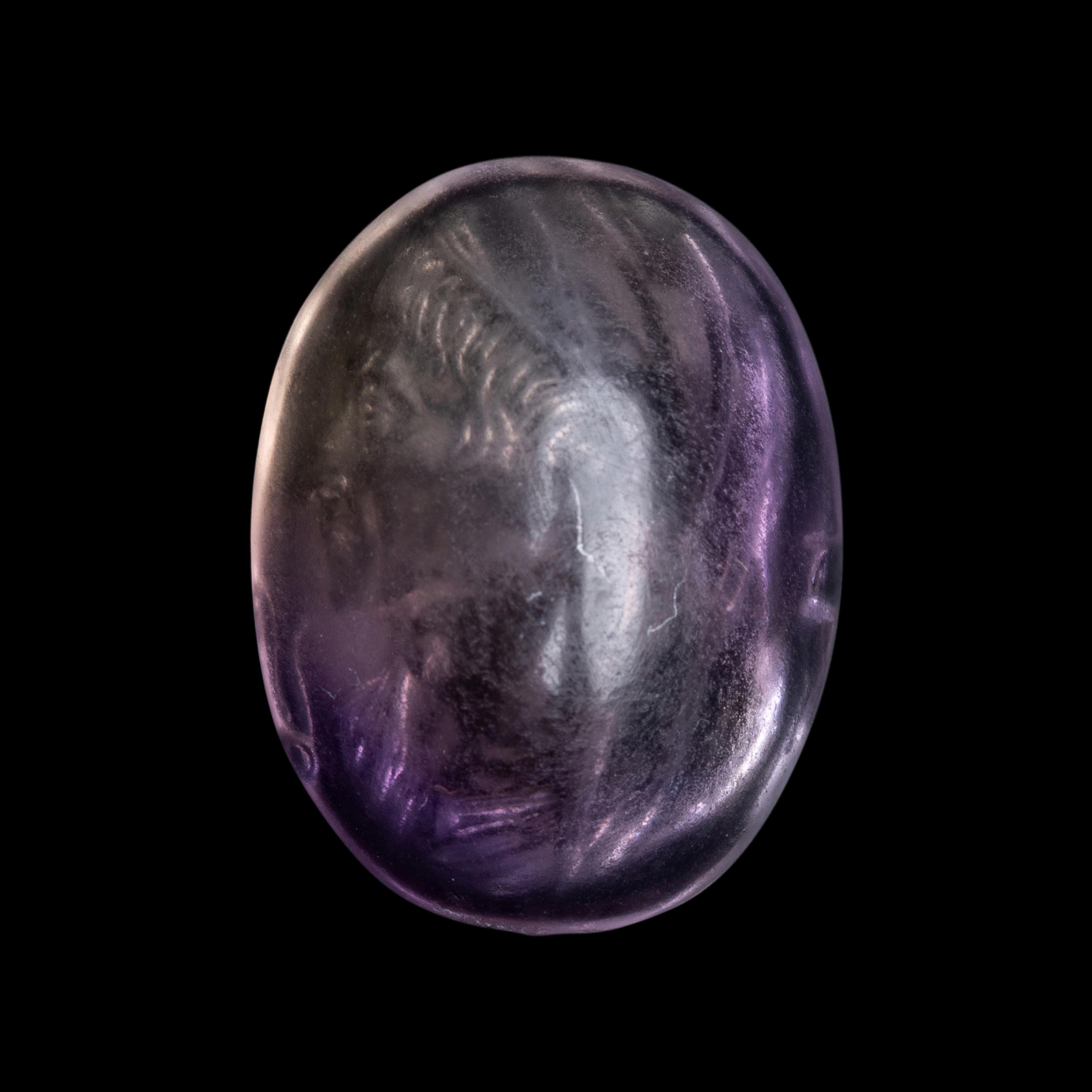 A Roman Amethyst Intaglio with a Portrait Head of a Veiled Man