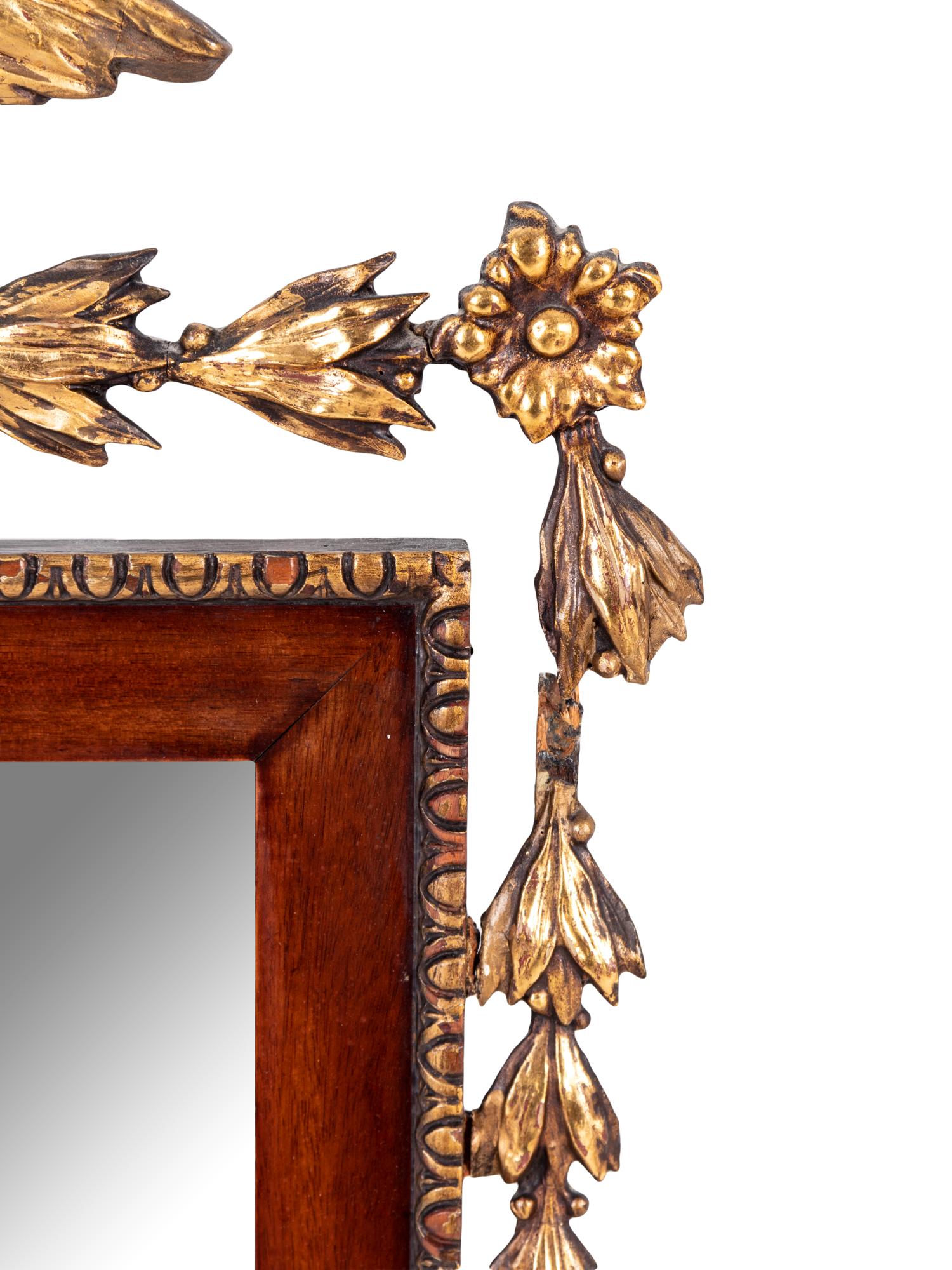 A Federal Style Parcel Gilt Mahogany Eagle-Mounted Looking Glass