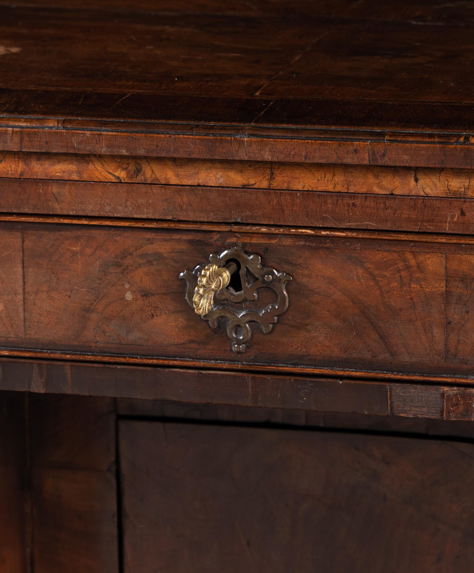 A George II Walnut Kneehole Desk