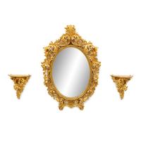 An Italian Rococo Style Carved Giltwood Oval Mirror and a Pair of Wall Brackets