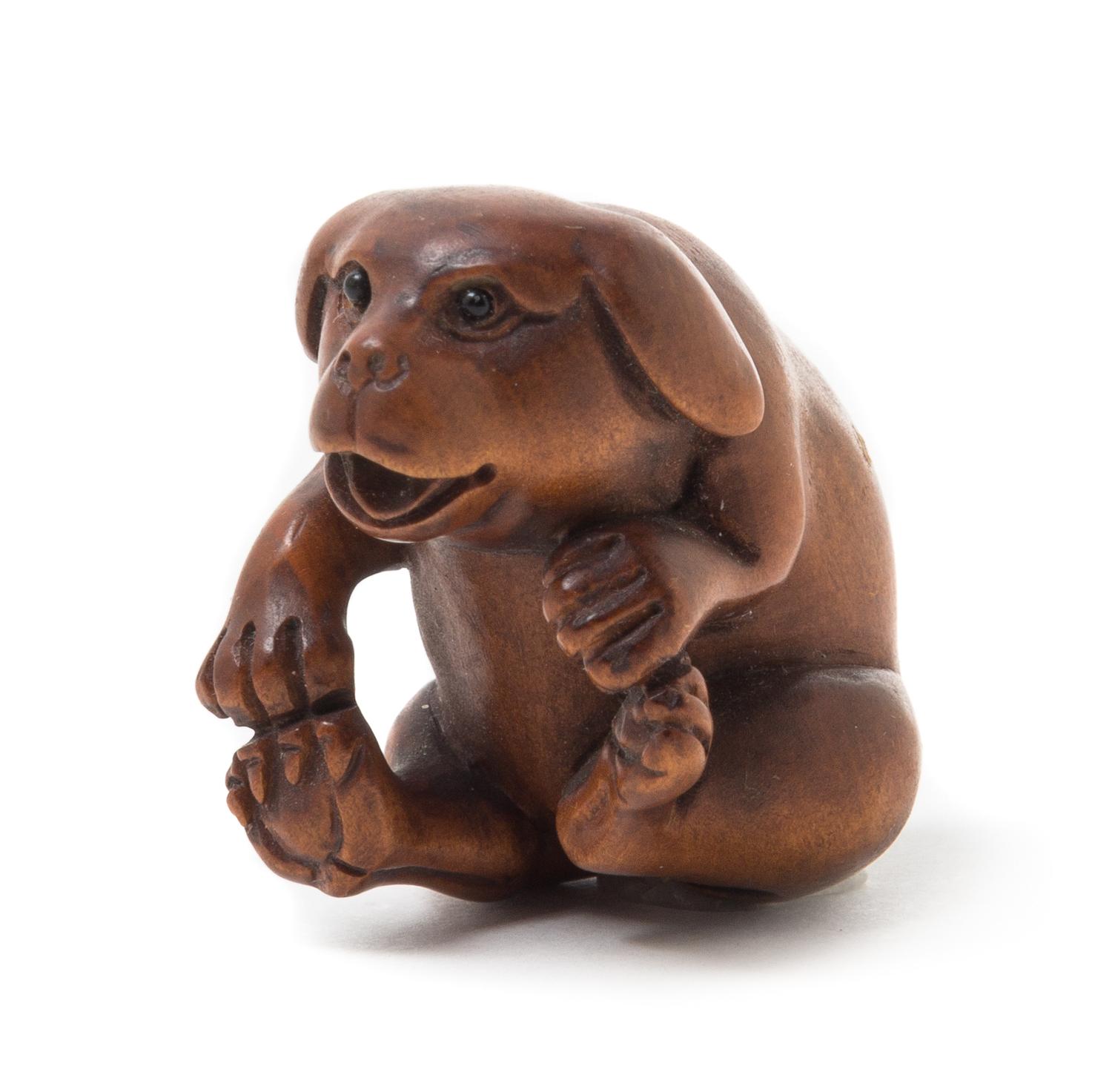 A Boxwood Netsuke Length 2 inches.