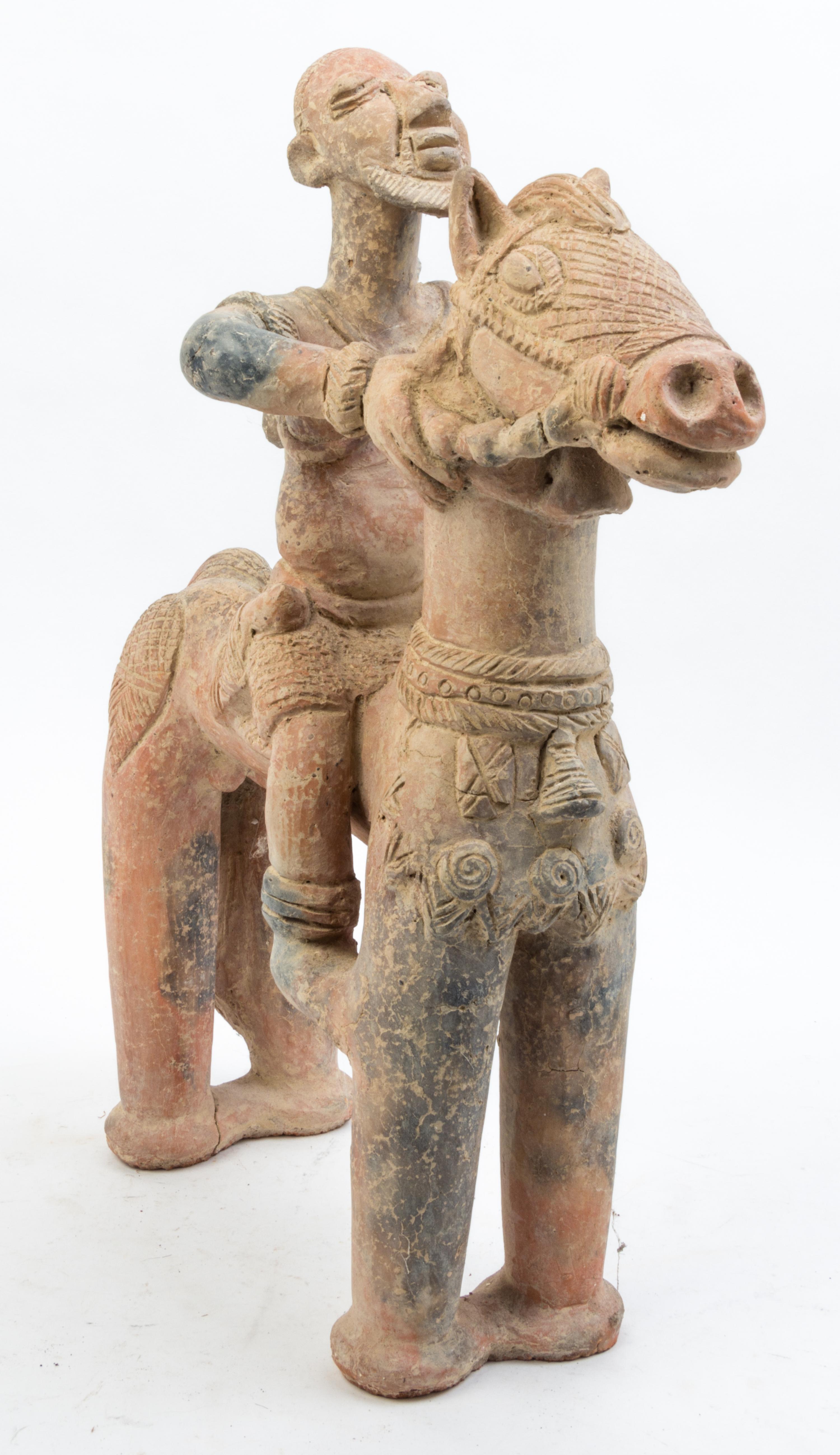 A Group of Neolithic and Pre-Columbian Style Pottery Articles Height of tallest 20 inches.