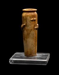 An Egyptian Bone Vase with Crocodiles in Relief