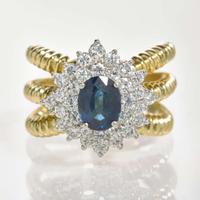 An 18K Yellow Gold, Sapphire, and Diamond Ring