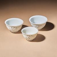 Three Chinese Blanc-de-Chine Porcelain Reticulated 'Floral' Cups, Mid 17th-Early 18th Century — 清中期 德化白瓷鏤雕花卉紋杯三隻