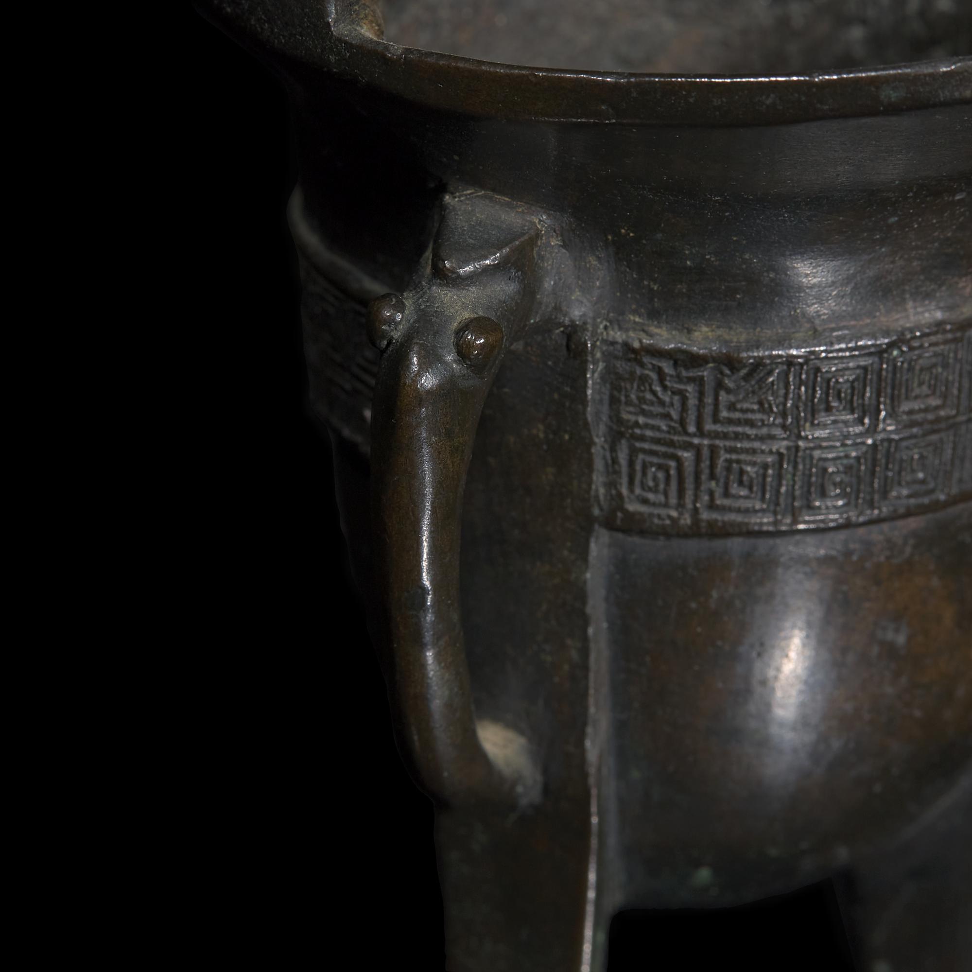 A Chinese Archaistic Patinated Bronze Jue Wine Cup, Late Ming to Qing Dynasty 明末清初 銅加漆爵杯