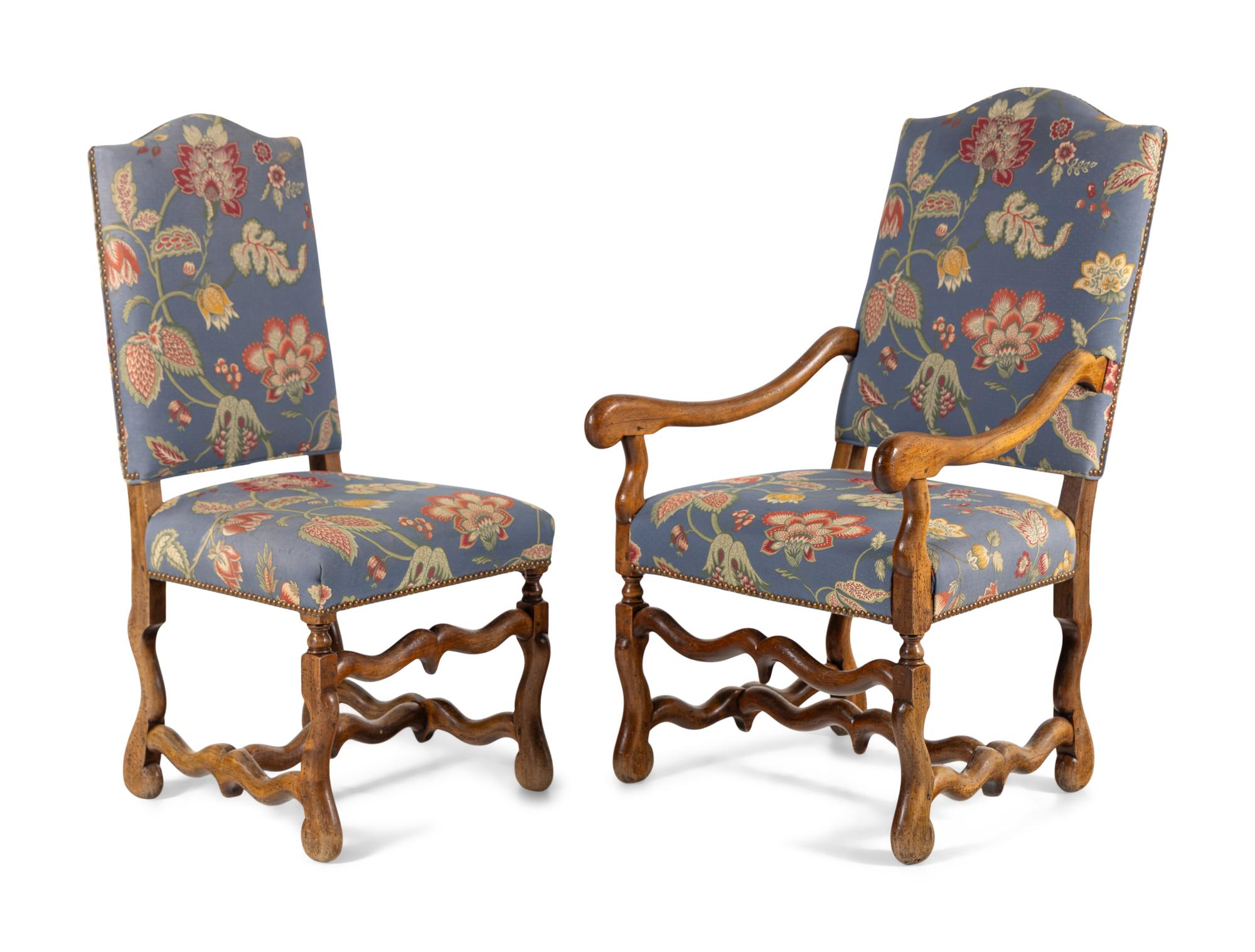 A Set of Eight Spanish Baroque Style Walnut Dining Chairs