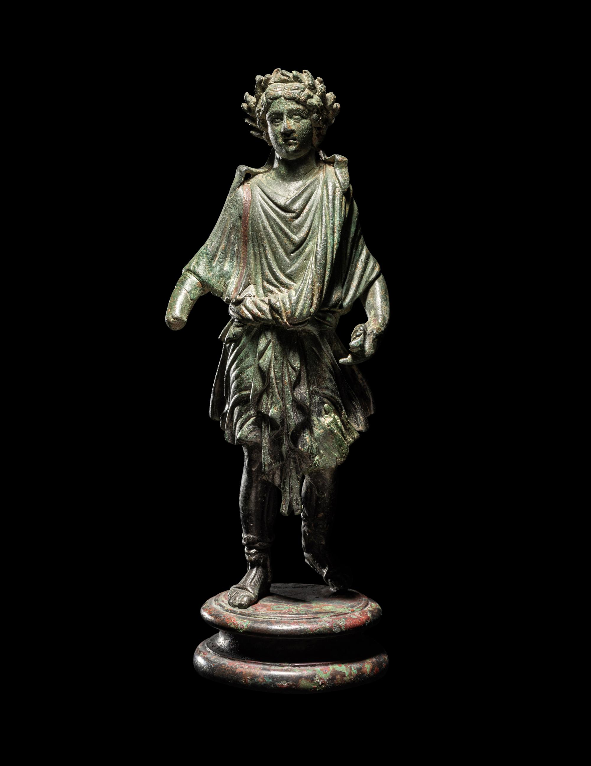 A Roman Bronze Lar with Copper Inlay