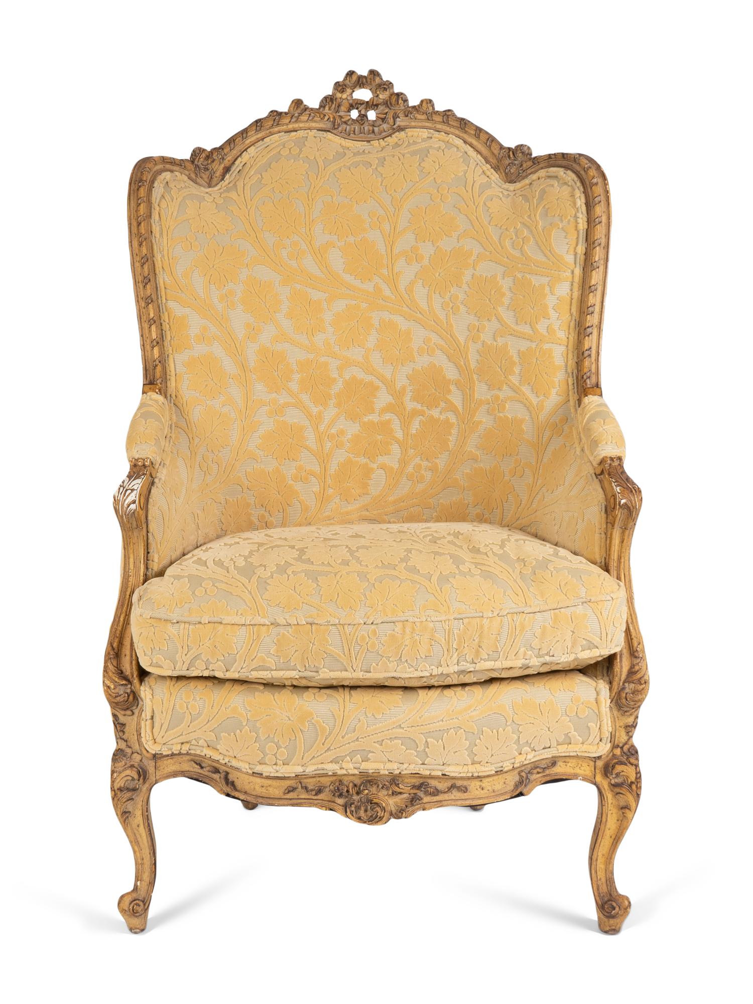 A Louis XV Style Carved and Painted Bergere A Oreille — 19TH CENTURY
