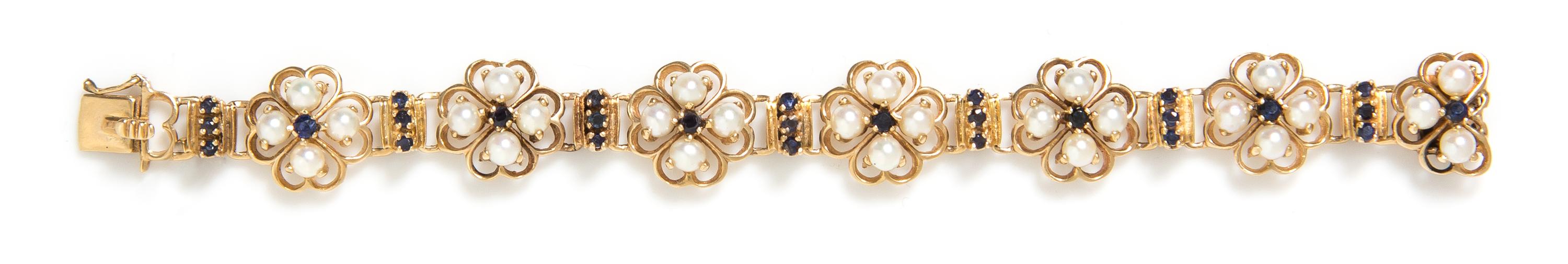 A 14 Karat Yellow Gold, Cultured Pearl and Sapphire Bracelet, 23.30 dwts.