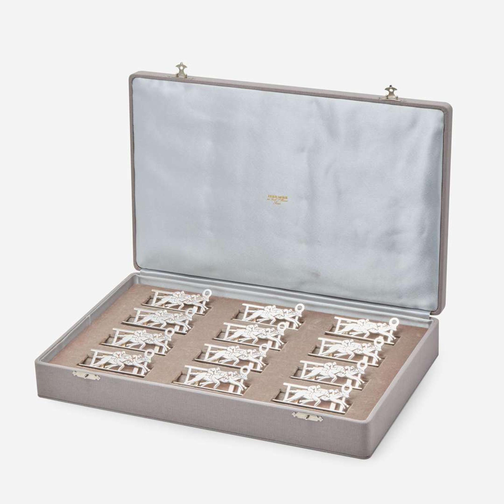 A Cased Set of Twelve French Sterling Silver Place Card Holders Hermès, Paris, mid 20th century