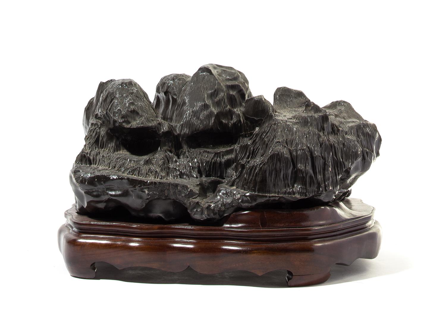 A Scholar's Rock Height 10 1/2 x width 15 1/2 x depth 11 1/2 inches.