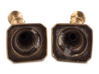 A Pair of Brass Candlesticks