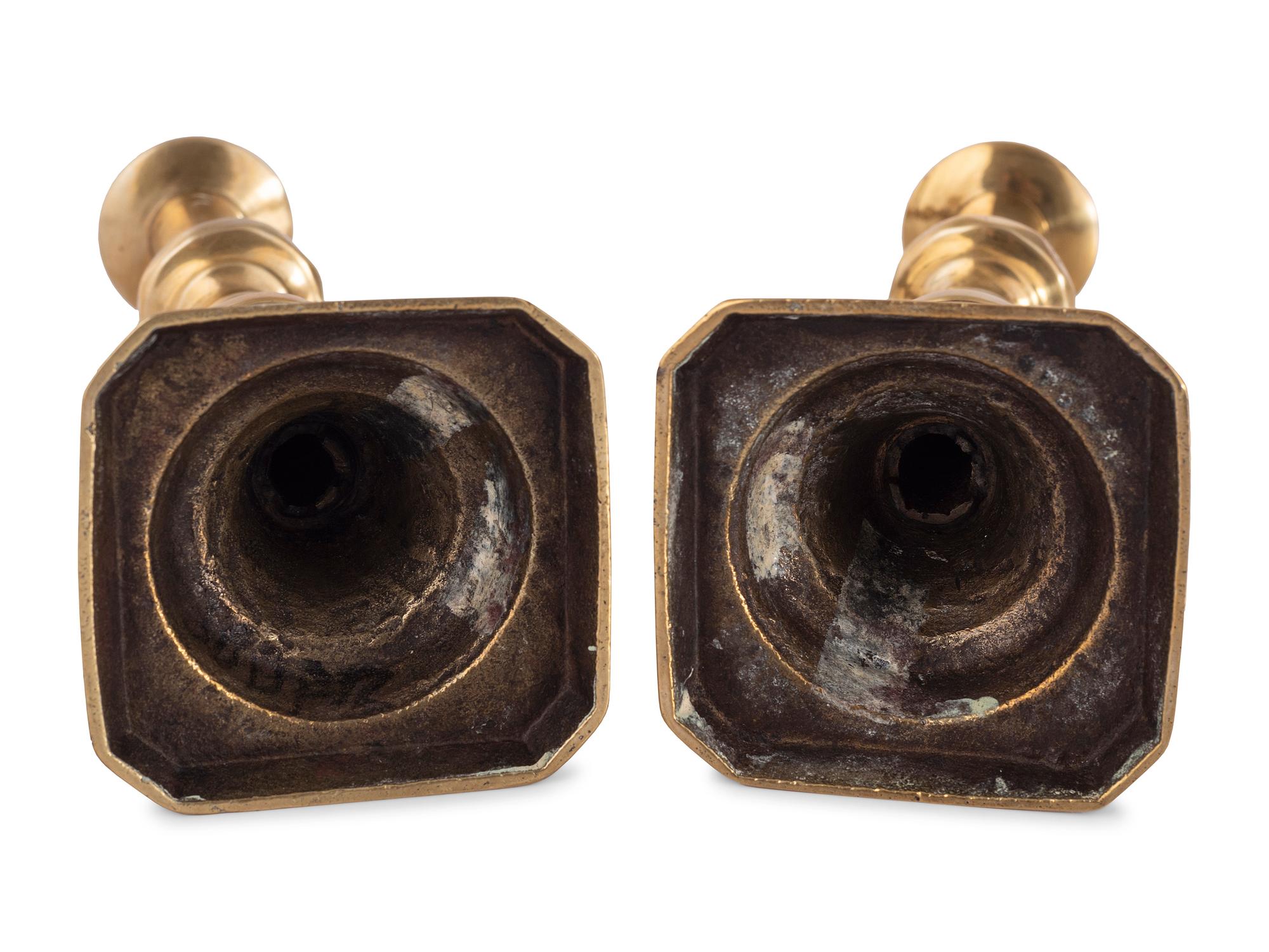 A Pair of Brass Candlesticks