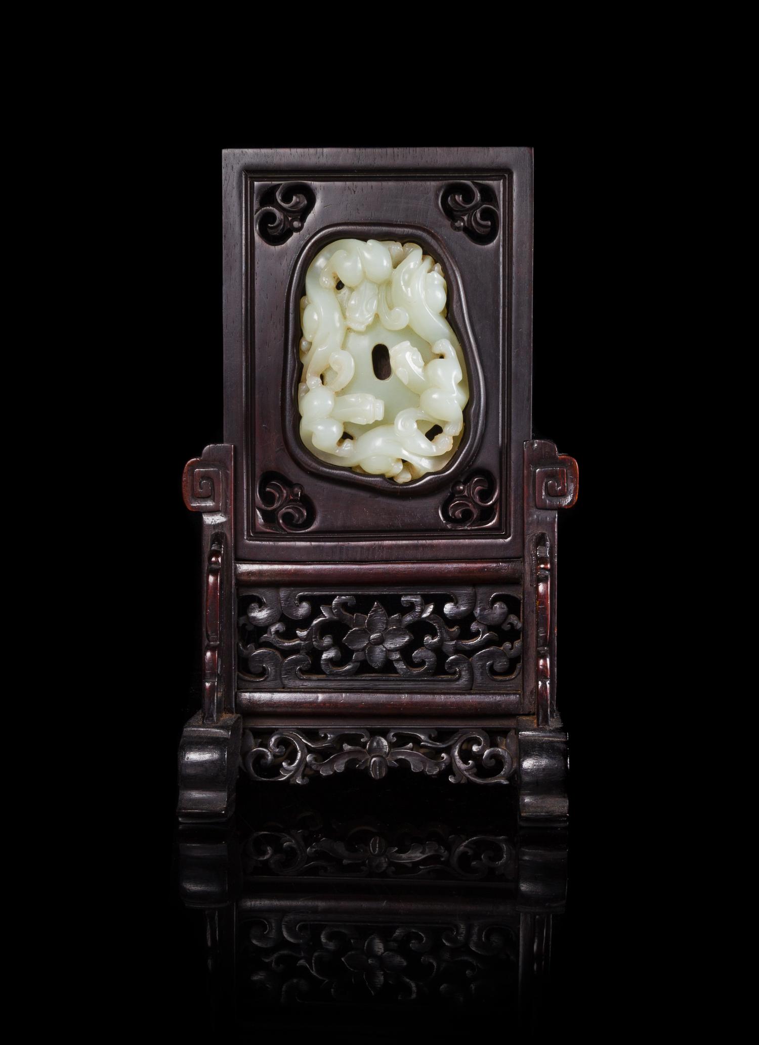 A Chinese White Jade Inset Hardwood Table Screen Height 9 1/8 inches.