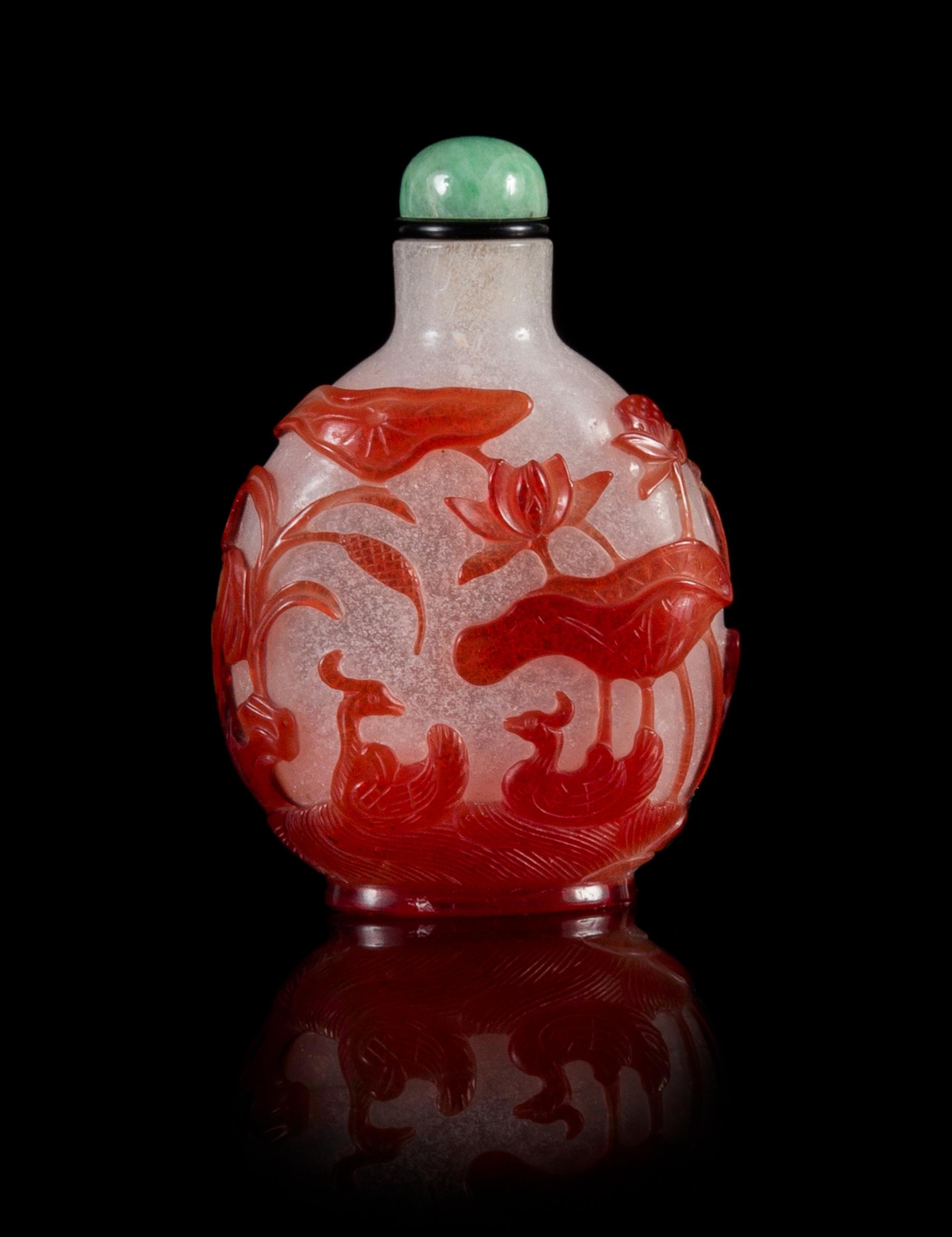 A Red Overlay Snowflake Ground Peking Glass Snuff Bottle Height 2 3/4 inches.