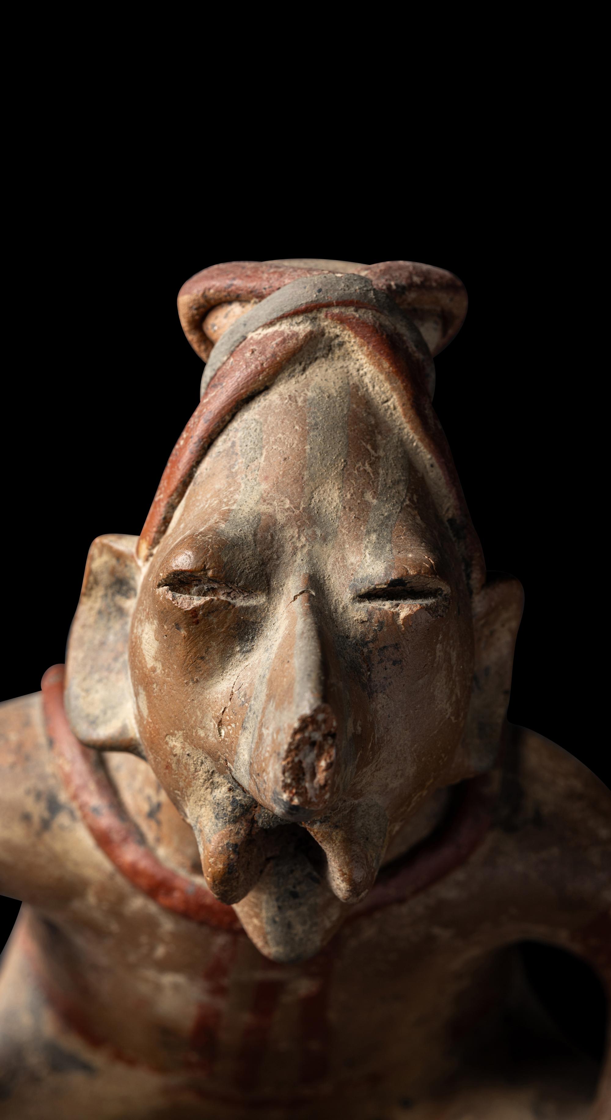 A Nayarit Seated Figure