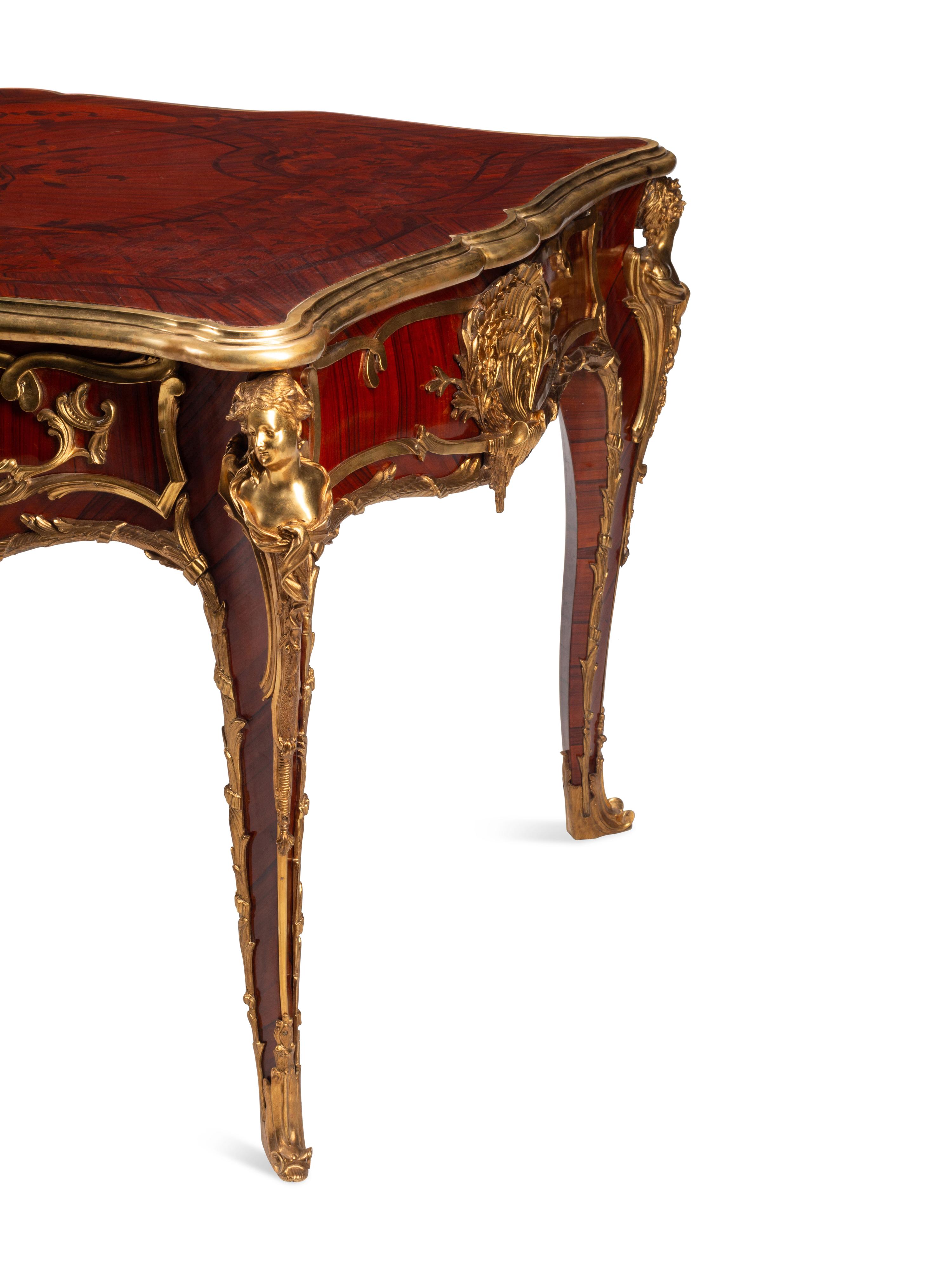 A Louis XV Style Gilt Bronze Mounted Kingwood Bureau Plat