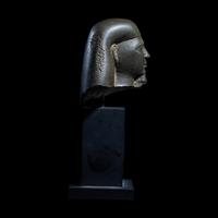 An Egyptian Schist Head of a Male
