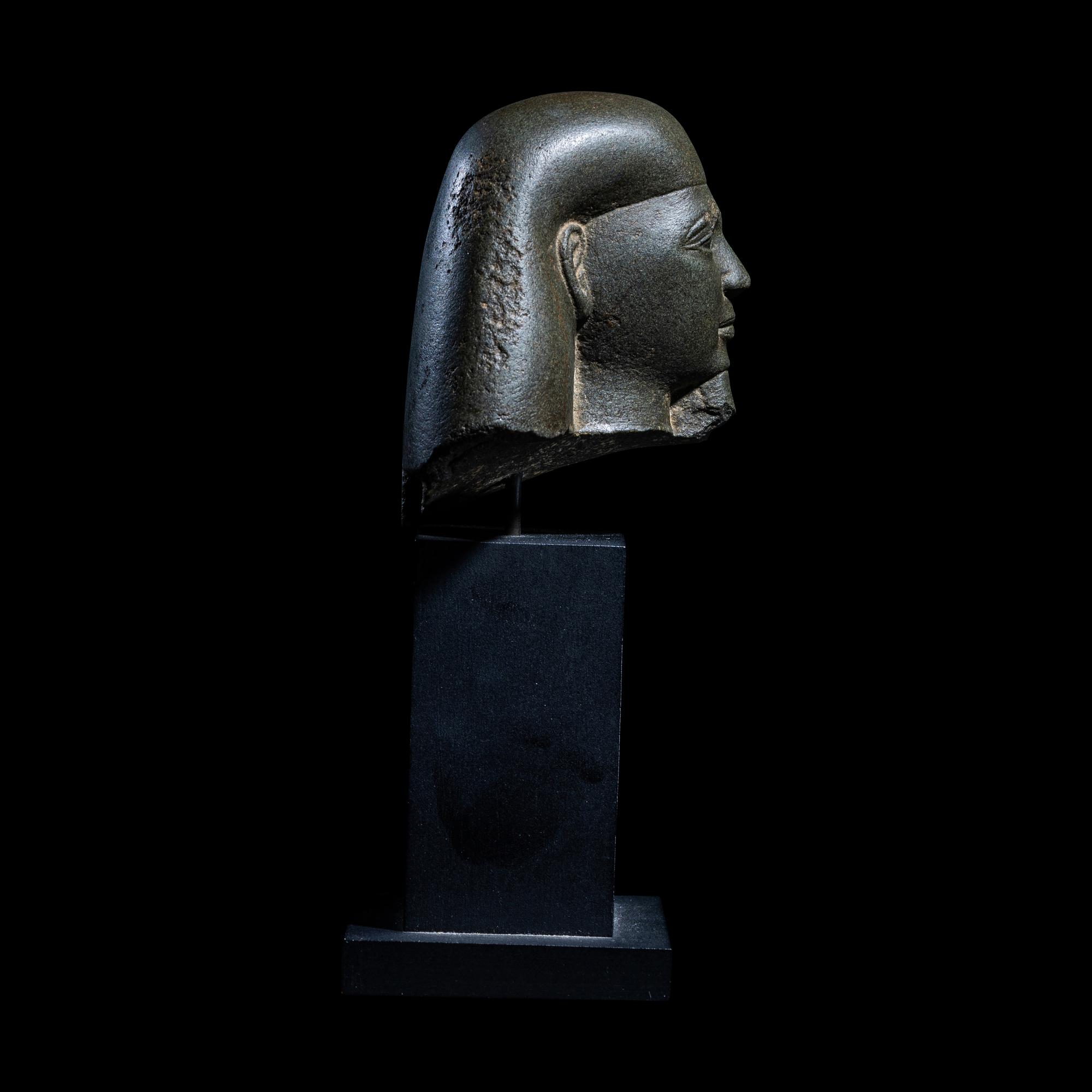 An Egyptian Schist Head of a Male