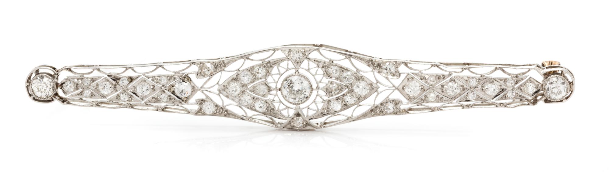 A Platinum and Diamond Bar Brooch, 6.80 dwts.