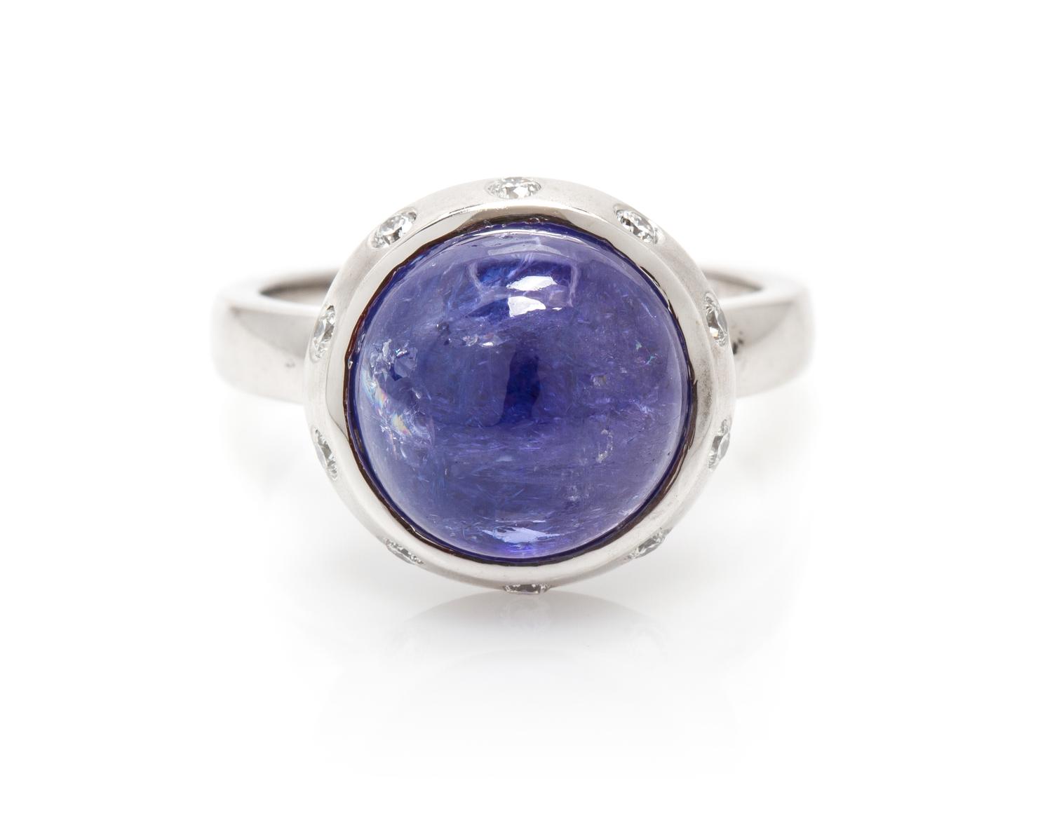 A 14 Karat White Gold, Tanzanite and Diamond Ring, 4.20 dwts.