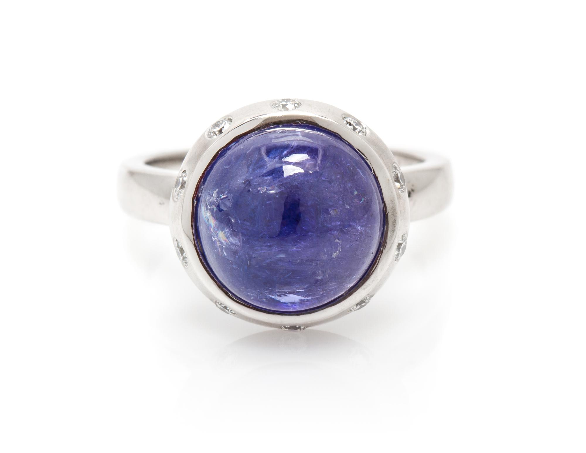 A 14 Karat White Gold, Tanzanite and Diamond Ring, 4.20 dwts.