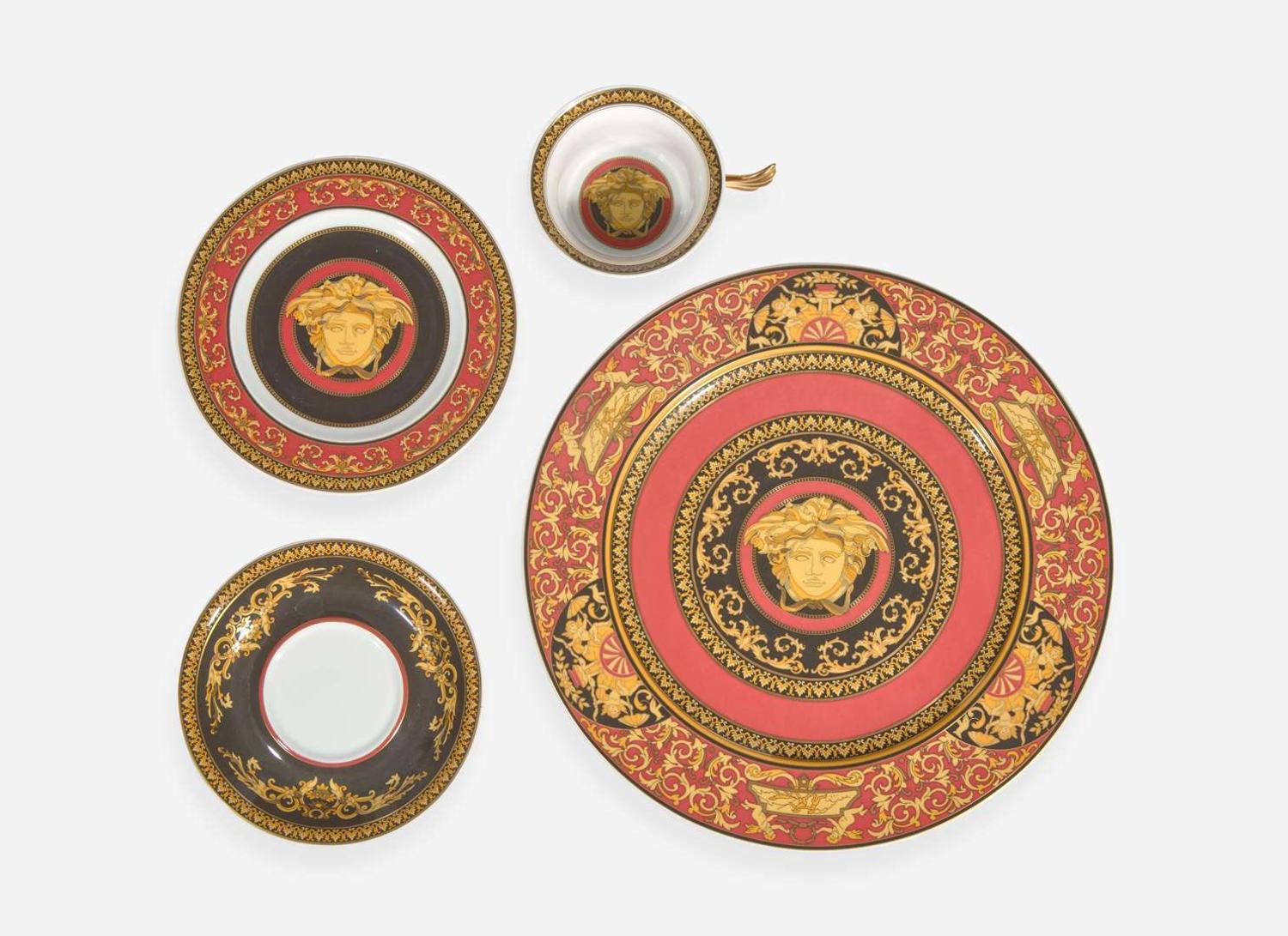 A Versace enameled porcelain part dinner service in the "Medusa" pattern, produced by Rosenthal Studio Line, Germany, modern