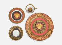 A Versace enameled porcelain part dinner service in the "Medusa" pattern, produced by Rosenthal Studio Line, Germany, modern