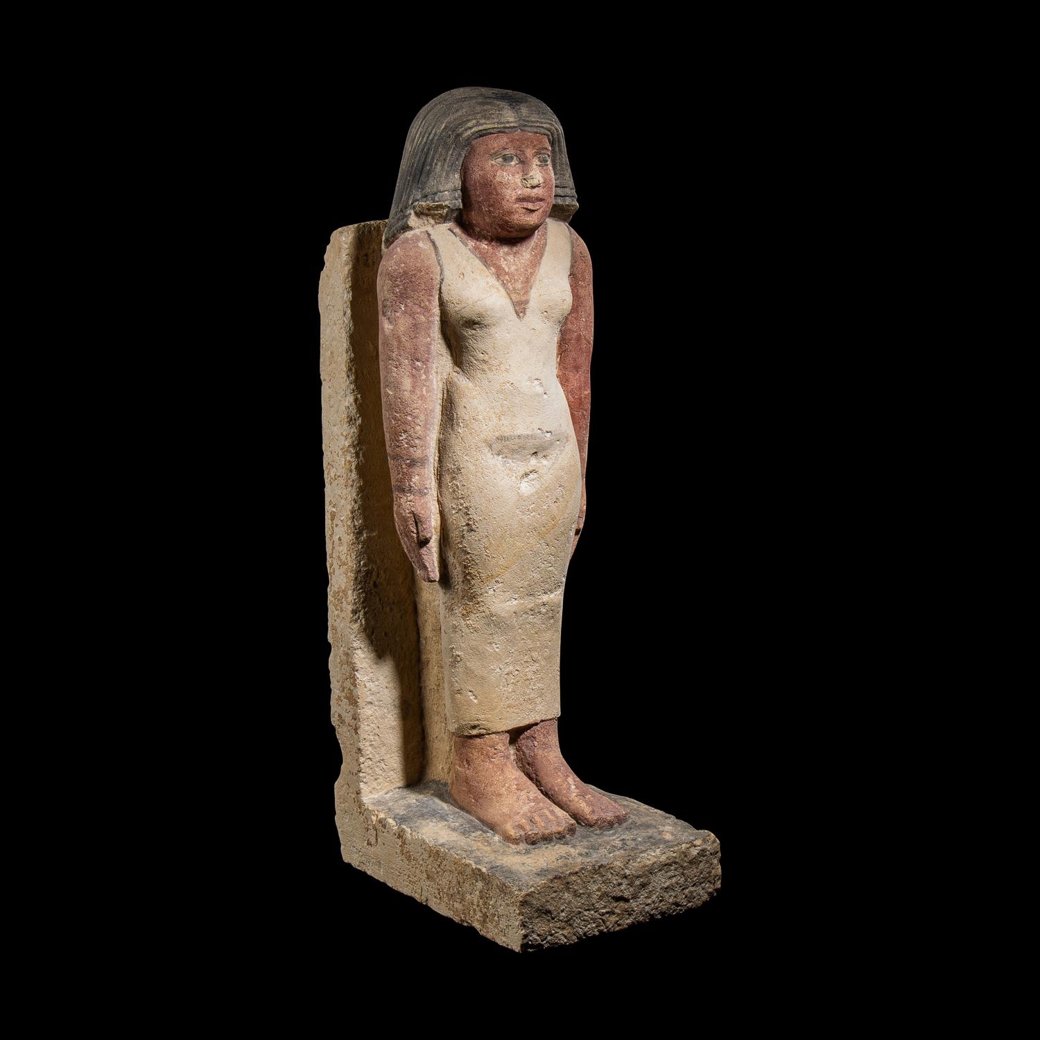 An Egyptian Painted Limestone Noblewoman