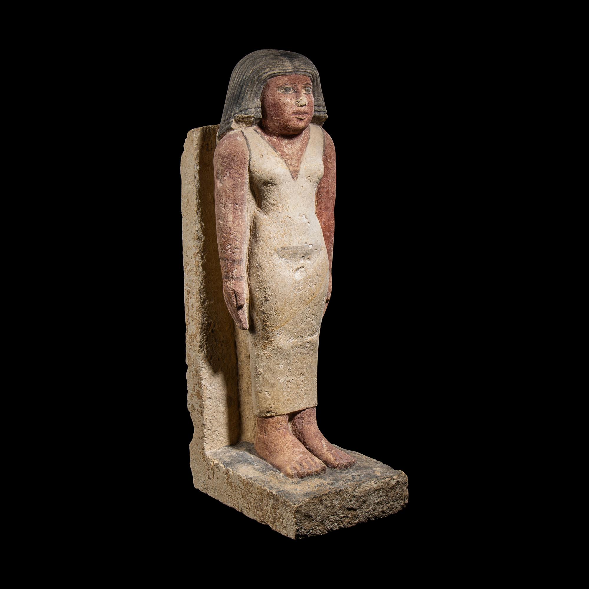 An Egyptian Painted Limestone Noblewoman