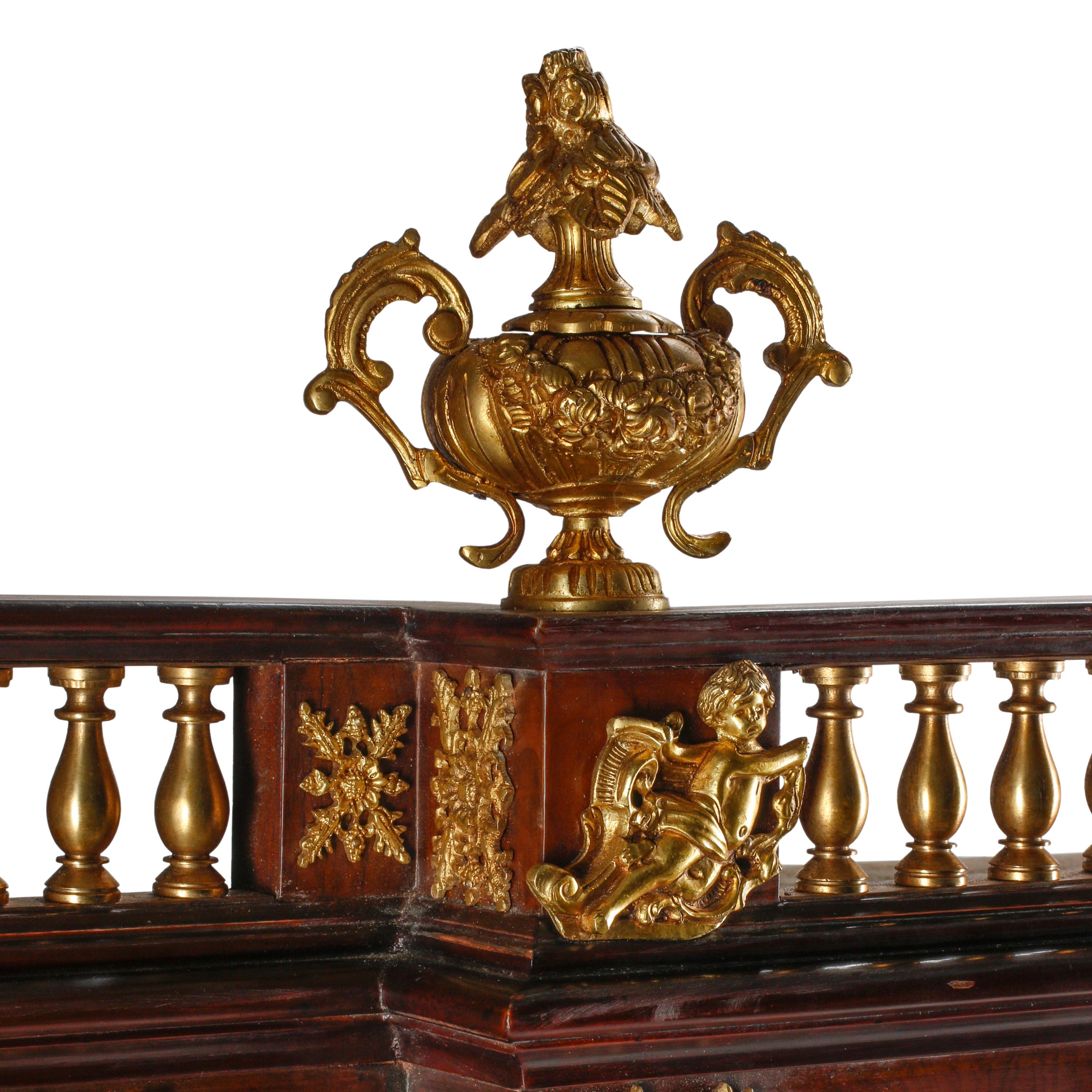 An Italian Baroque Style Gilt Bronze Mounted Pietra Dura, Lapis Lazuli and Giltwood Cabinet on Stand