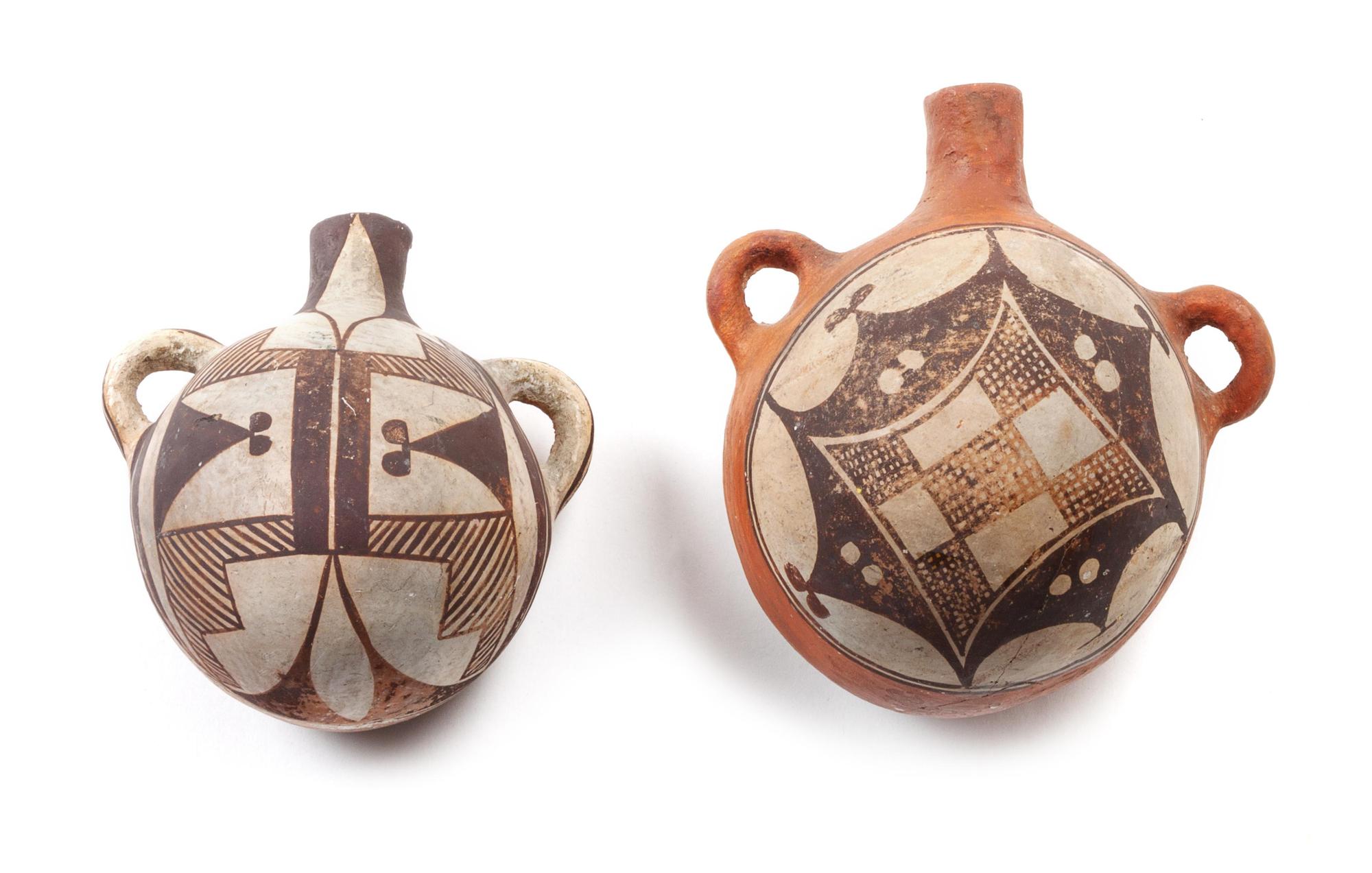 Two Zia and Acoma Canteens