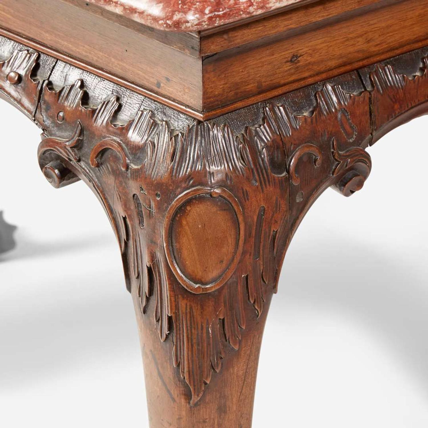 A George II carved walnut side table with breccia marble top circa 1750