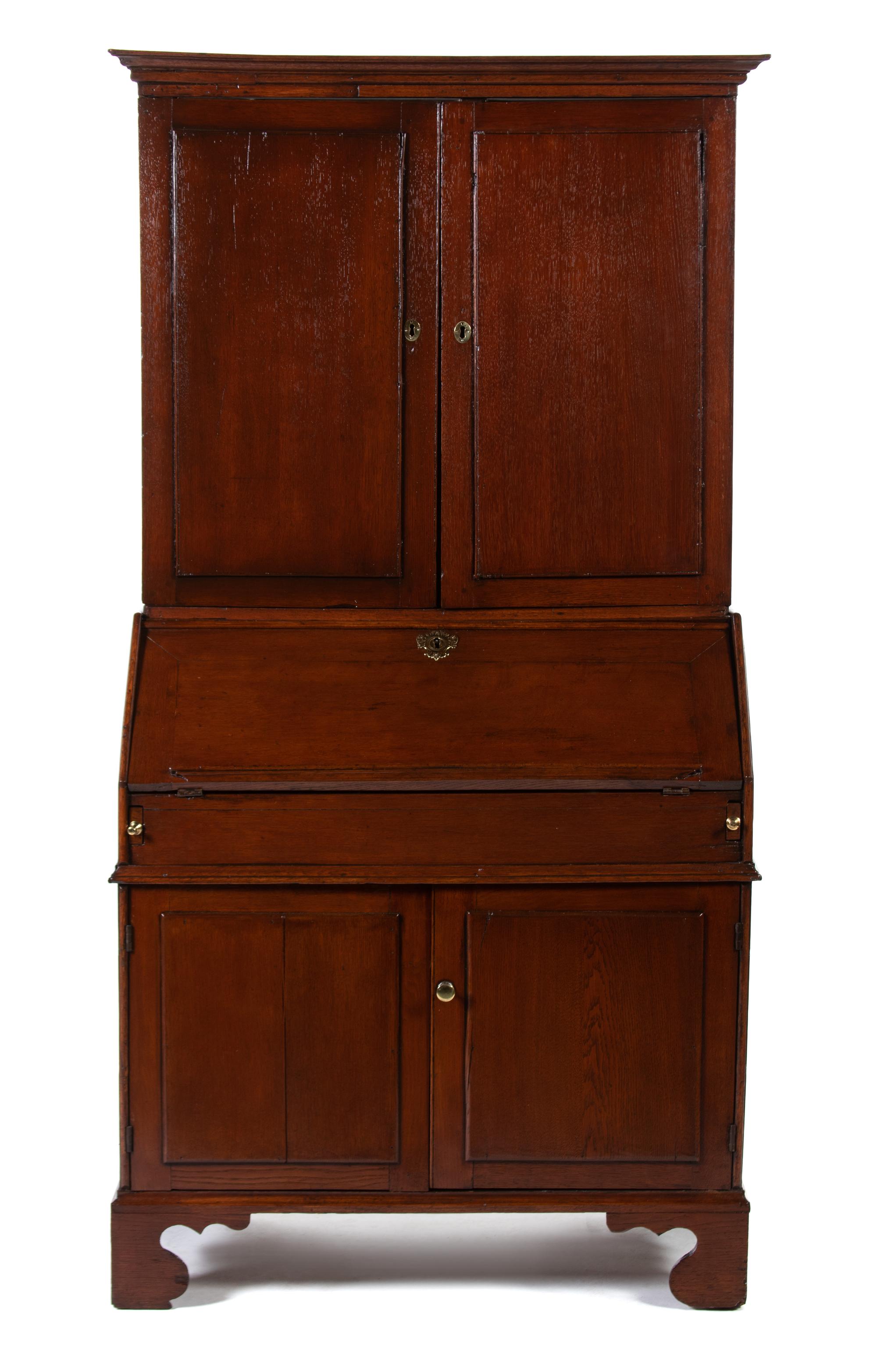 A George III Provincial Style Oak Secretary Bookcase